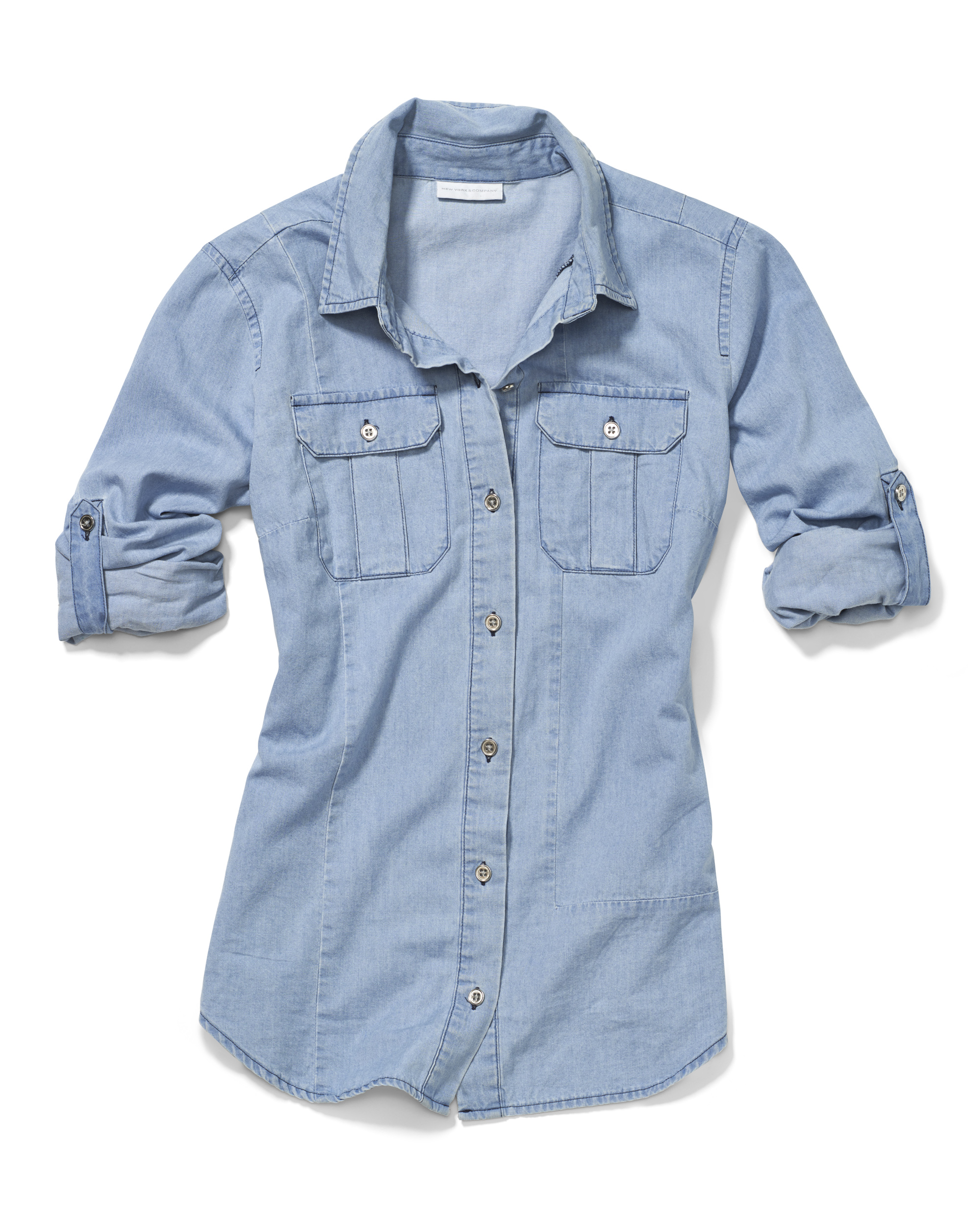 a product photograph of a denim shirt with soft styling on white