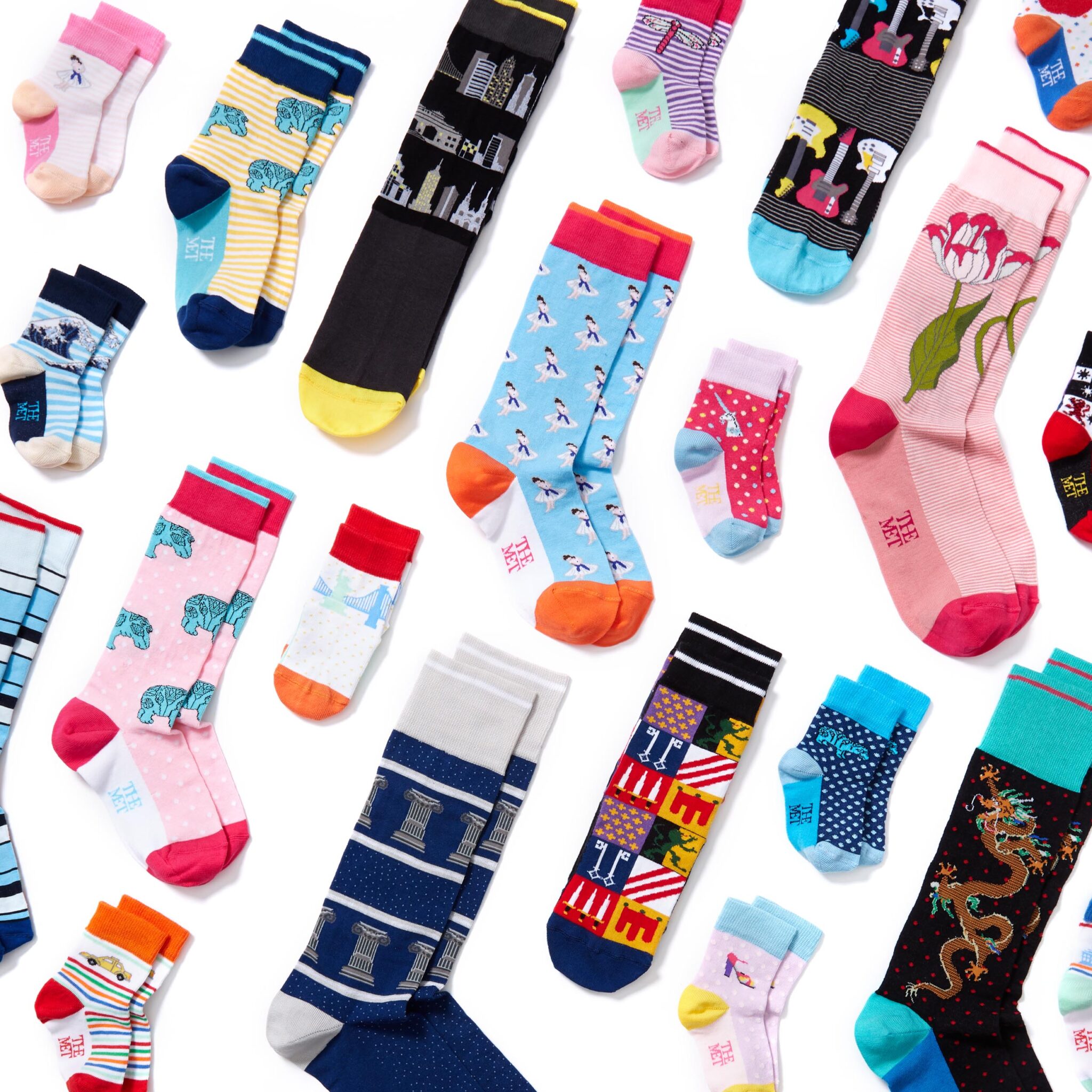 a marketing photograph of many socks styled in an angled grid on white