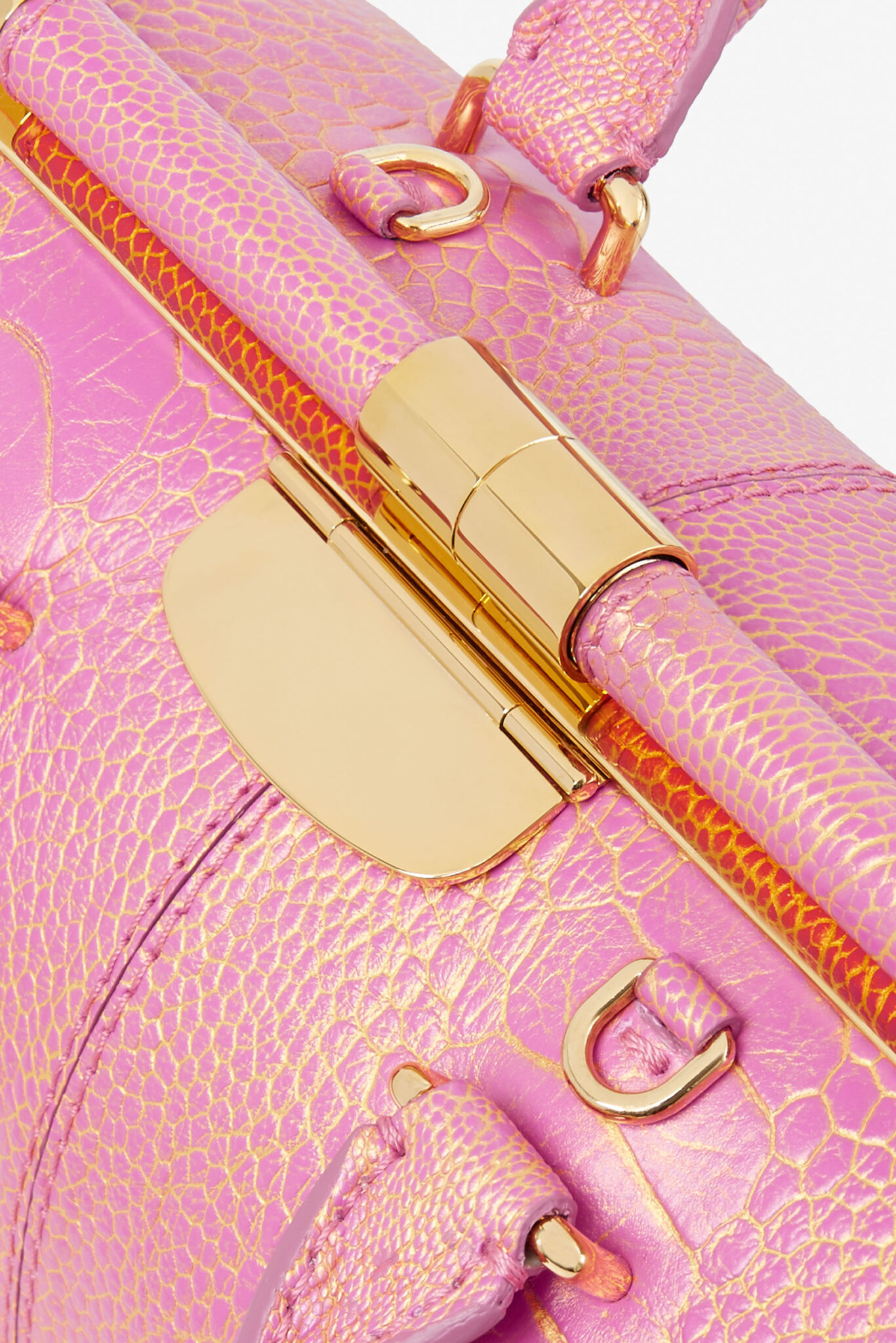 e-commerce product detail of pink and gold ostrich leg doctor bag