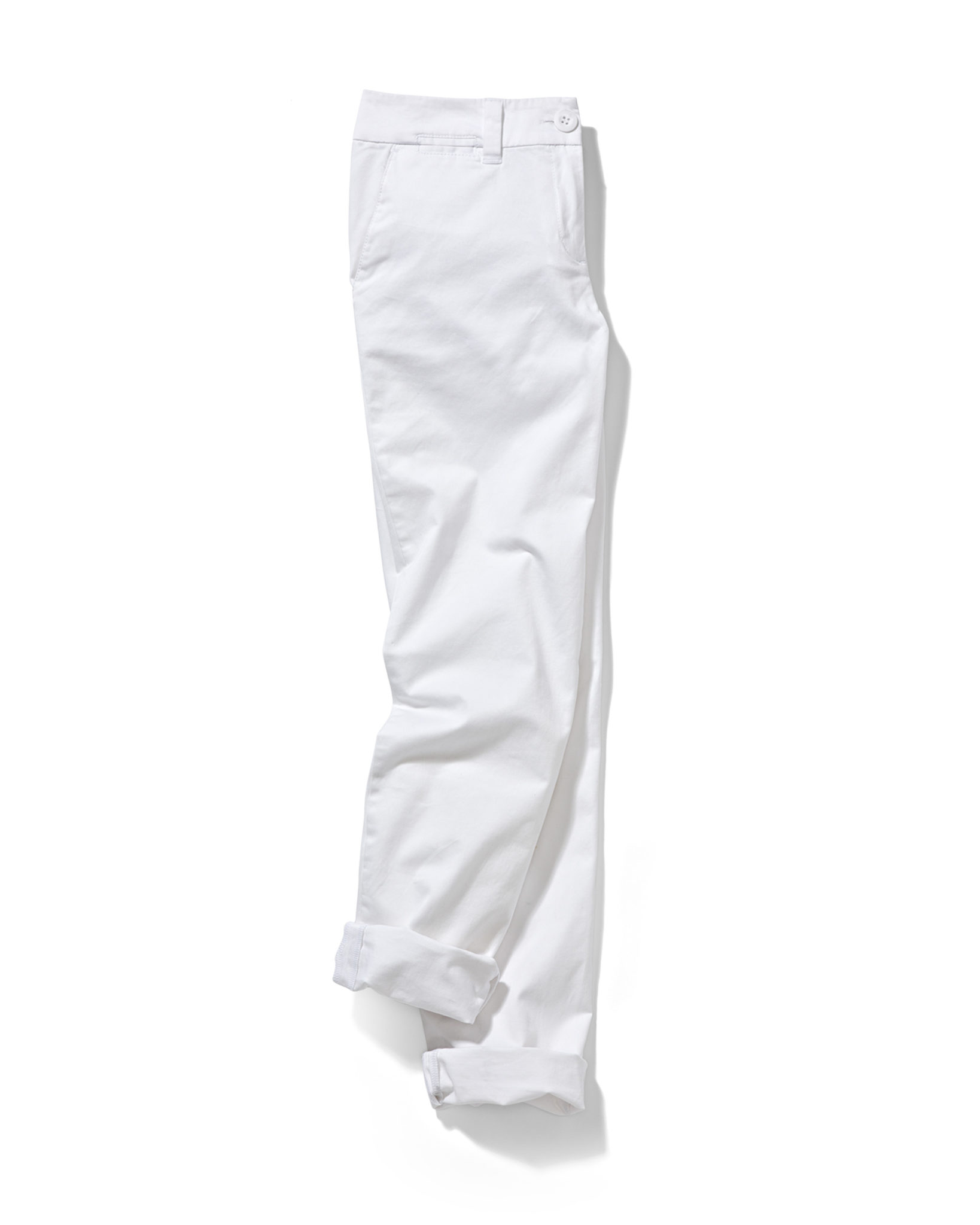 a marketing photograph of white pants with soft styling on white